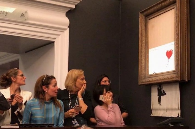 Картина Бенксі самознищилася після того, як її продали за $1,4 млн
